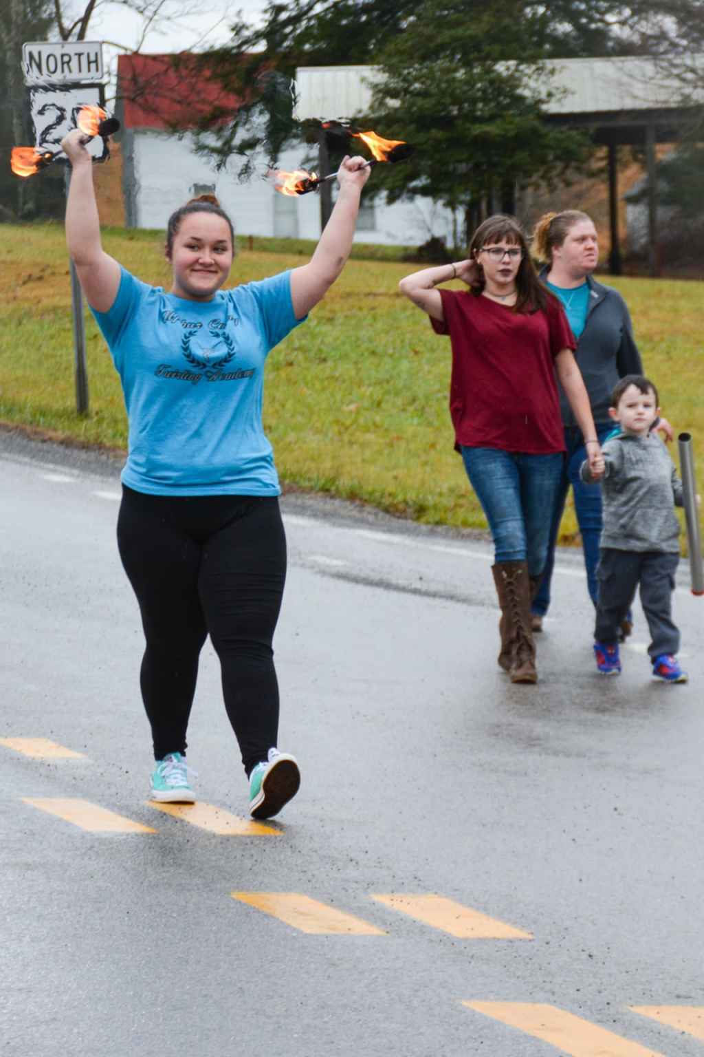 Santa opts for covered sleigh at rainy Rock Cave Christmas parade