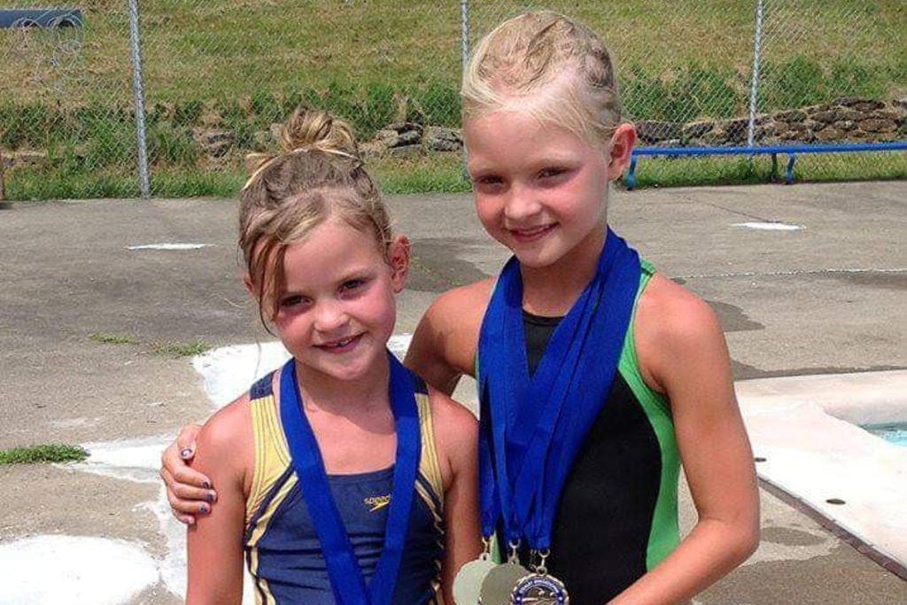 Cadence Vincent with her sister Riley when they started swimming.