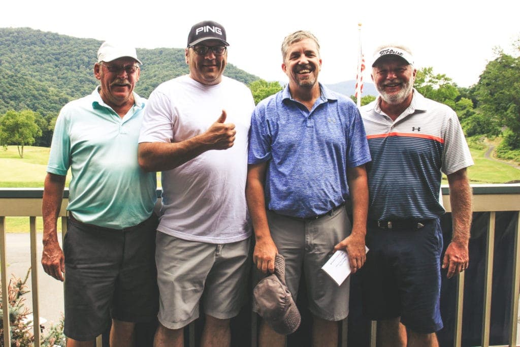 Second Place: Appalachian Mineral Title Company with players Greg Jones, Mike Miller, Bobby Russell and Todd Westfall.
