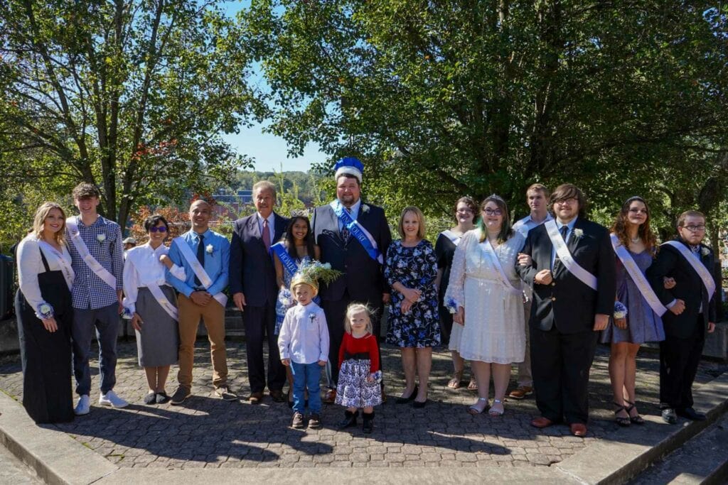 The 2021 Glenville State College Homecoming Court (l-r) Sophomore Princess Emily Lewis and escort Cayden Hayes, Senior Princess Andrea Vidal, Senior Prince Alex Pondexter, GSC President Dr. Mark Manchin, Homecoming Queen Jahnvi Duncan, Court Attendant Lucas Butcher, Homecoming King Austin Cochran, Court Attendant Kendall Duelley, GSC First Lady Gigi Manchin, Junior Princess Cassie Hyre, Senior Princess Keelin Howes, Junior Princess Escort Jacob Long, Senior Princess Escort Joe Lutsy, Freshman Princess Courtney Goad, and Freshman Prince Spencer Waggoner.