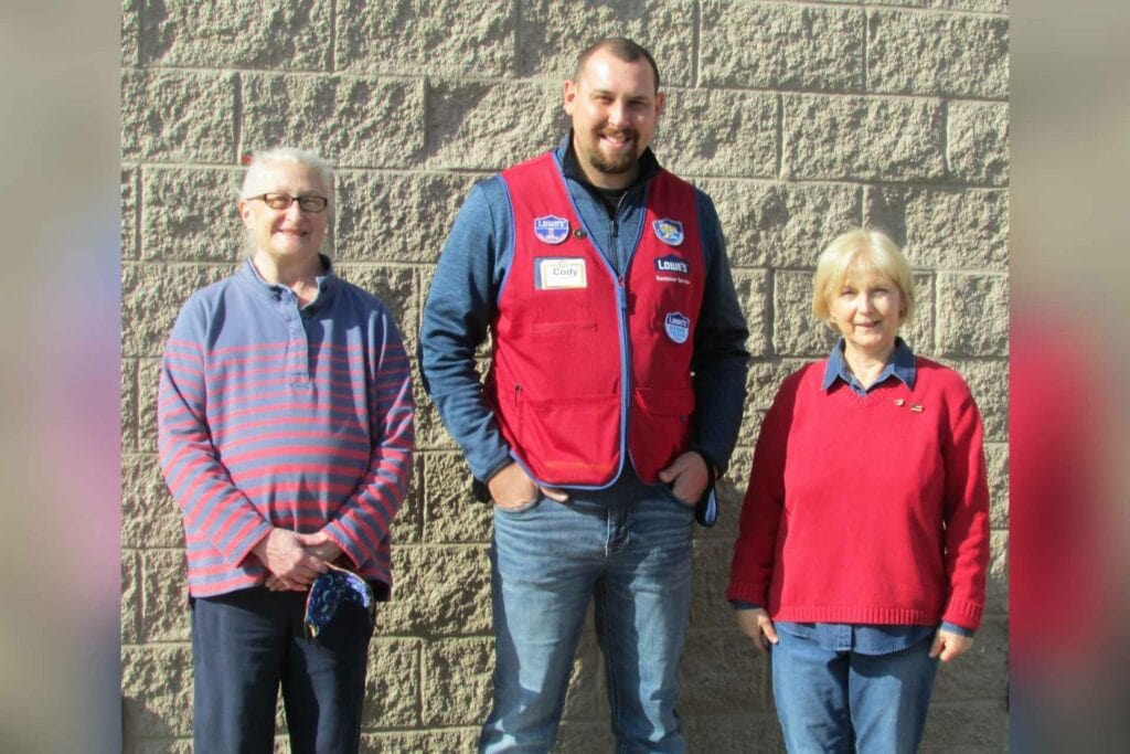 Pictured left to right: Donna Carpenter, Lowe's Store Manager Cody McGee and Beth Post.