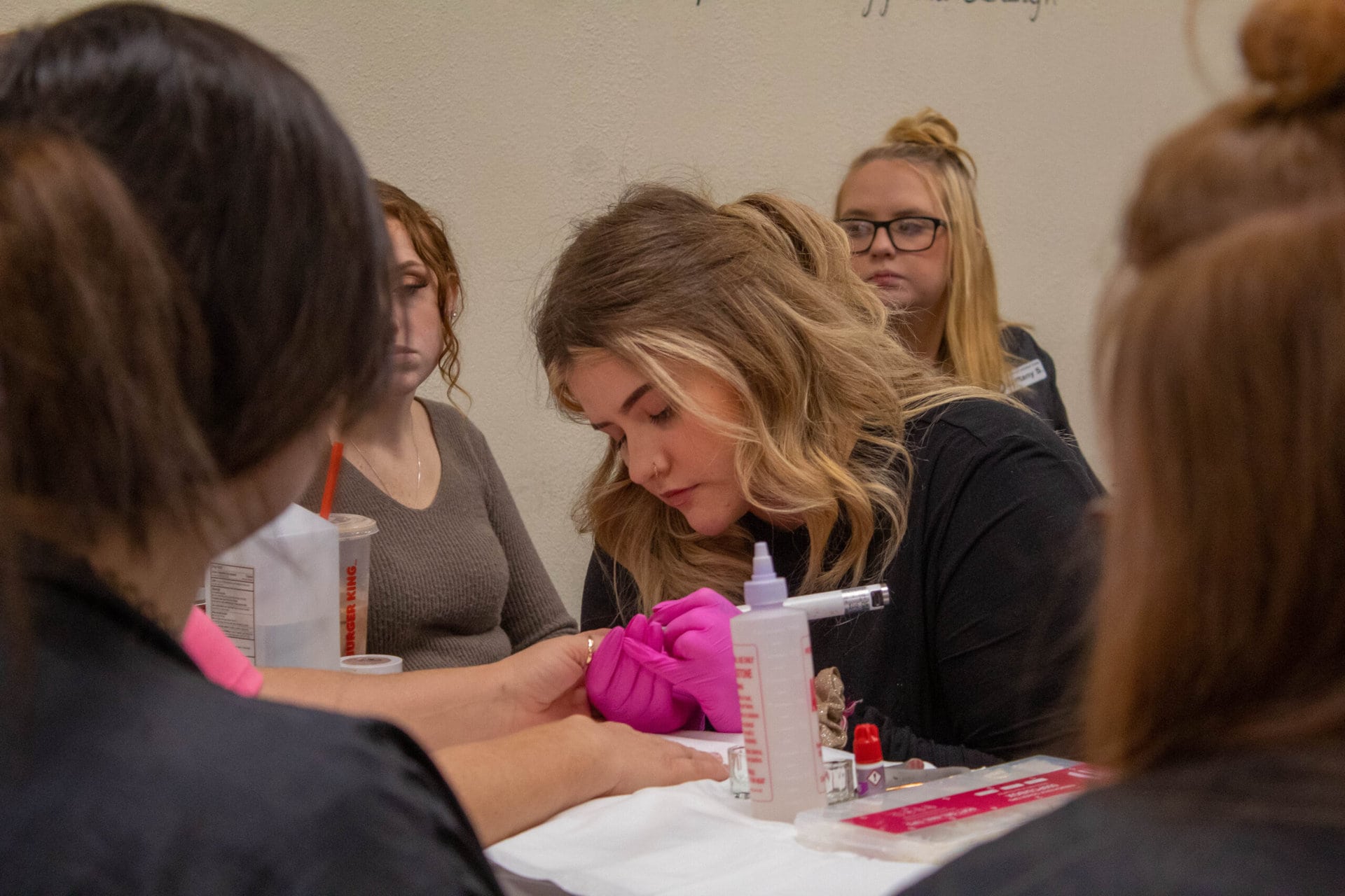 Fred Eberle cosmetology graduates return to school to give manicure ...